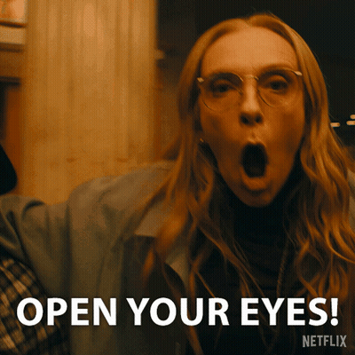 A Woman With Her Mouth Open And The Words " Open Your Eyes " Behind Her GIF