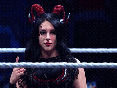 A Woman With Horns Is Giving A Thumbs Up Sign GIF