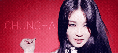 A Woman With Long Black Hair Is Standing In Front Of A Red Background With The Name Chungha Above Her GIF