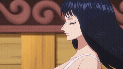 A Woman With Long Black Hair Is Wearing A White Top GIF