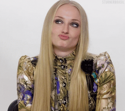 A Woman With Long Blonde Hair Is Making A Funny Face And The Words Sturnerbrasil Are On The Bottom GIF