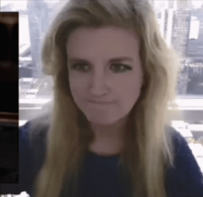 A Woman With Long Blonde Hair Is Making A Funny Face GIF