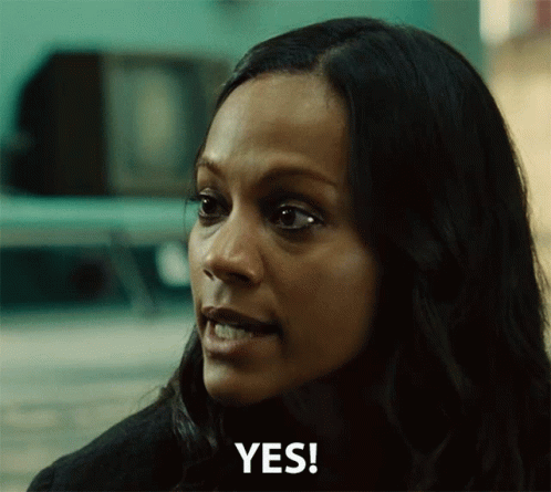 A Woman With Long Dark Hair Says Yes GIF