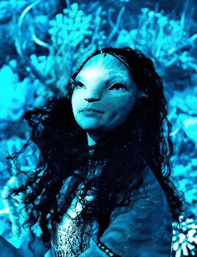 A Woman With Long Hair And A Blue Face Is Looking Up At The Sky GIF