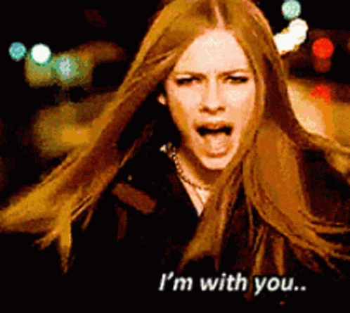 A Woman With Long Hair Is Screaming With The Words I 'M With You GIF