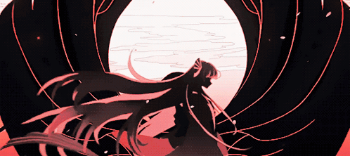 A Woman With Long Hair Is Standing In A Dark Tunnel GIF