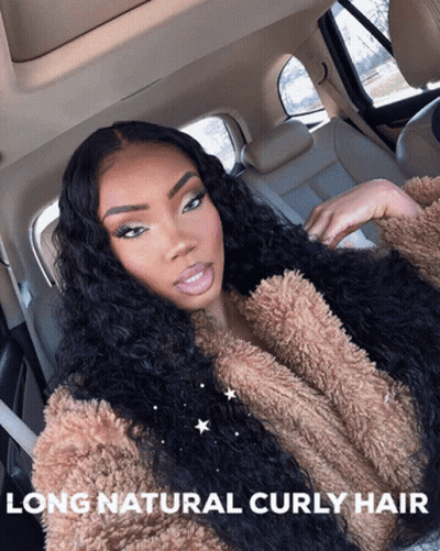 A Woman With Long Natural Curly Hair Is In The Back Seat Of A Car GIF