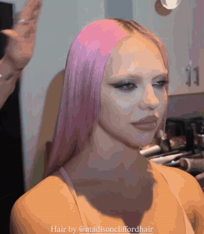 A Woman With Long Pink Hair Is Getting Her Hair Done By Madisoncliffordhair GIF