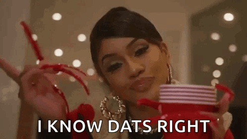 A Woman With Long Red Nails Is Holding A Cup Of Coffee And A Plate . GIF
