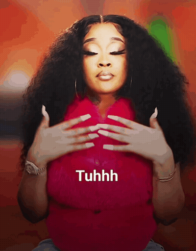 A Woman With Long White Nails Is Wearing A Red Shirt That Says Tuhhh On The Bottom GIF
