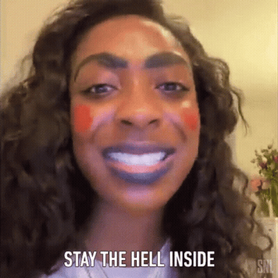 A Woman With Makeup On Her Face And The Words `` Stay The Hell Inside '' Written On Her Face . GIF