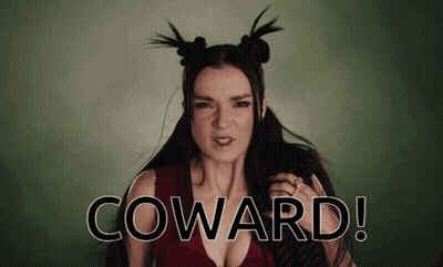 A Woman With Pigtails And The Word Coward On The Bottom Right GIF
