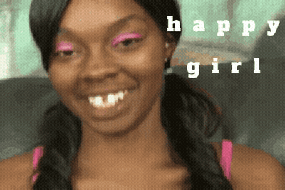 A Woman With Pink Eye Shadow Is Smiling With The Words Happy Girl Behind Her GIF