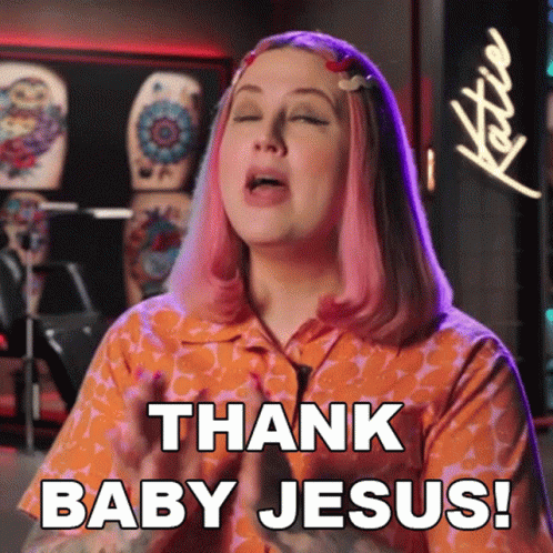 A Woman With Pink Hair Says Thank Baby Jesus . GIF