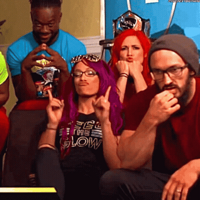 A Woman With Purple Hair And A Shirt That Says Feel The Glow GIF