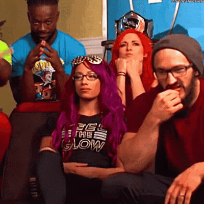 A Woman With Purple Hair And A Shirt That Says Feel The Glow GIF