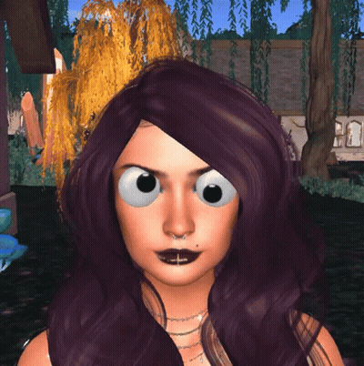A Woman With Purple Hair And Big Eyes Looks Angry GIF