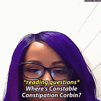 A Woman With Purple Hair And Glasses Is Asking Where 'S Constable Constipation Corbin . GIF