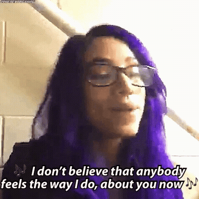 A Woman With Purple Hair And Glasses Is Saying I Don 'T Believe That Anybody Feels The Way I Do About You GIF