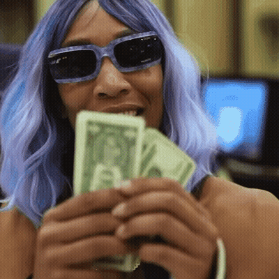 A Woman With Purple Hair And Sunglasses Is Holding A Bunch Of Dollar Bills GIF