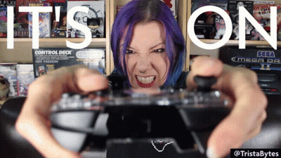 A Woman With Purple Hair Is Holding A Video Game Controller With The Words " It 'S On " Written Above Her GIF