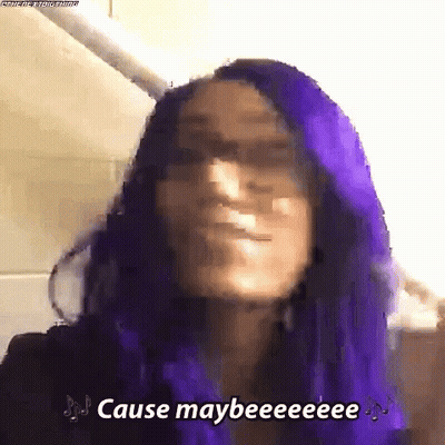 A Woman With Purple Hair Is Making A Funny Face And Says Cause Maybeeeee . GIF