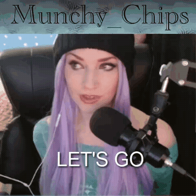 A Woman With Purple Hair Is Sitting In Front Of A Microphone With The Words " Let 'S Go " Above Her GIF