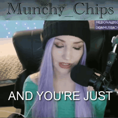A Woman With Purple Hair Is Sitting In Front Of A Microphone With The Words " Munchies And You 'Re Just " GIF