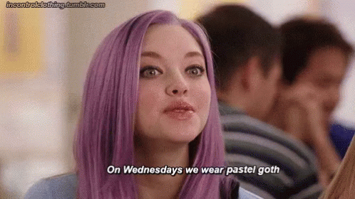 A Woman With Purple Hair Is Wearing A Pastel Goth Wig . GIF