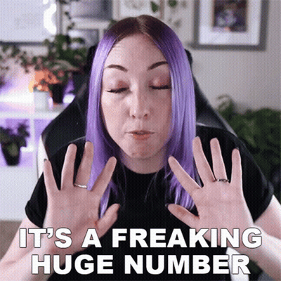 A Woman With Purple Hair Says It 'S A Freaking Huge Number With Her Hands GIF