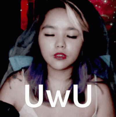 A Woman With Purple Hair Says Uwu In Front Of Her GIF