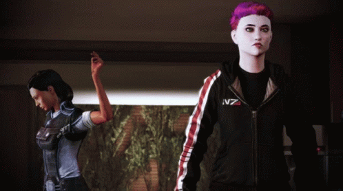 A Woman With Purple Hair Wears A Black N7 Sweatshirt GIF