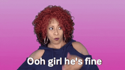 A Woman With Red Curly Hair Says " Ooh Girl He 'S Fine " GIF