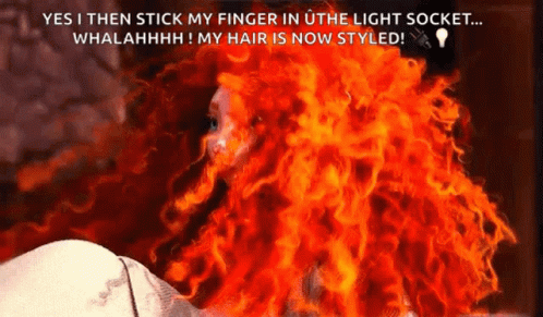 A Woman With Red Curly Hair Says " Yes I Then Stick My Finger In Uthe Light Socket ... Whalahhhh " GIF