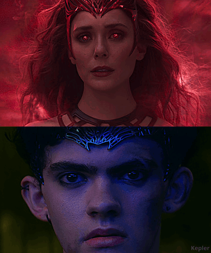 A Woman With Red Eyes And A Man With Blue Eyes GIF