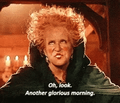 A Woman With Red Hair And A Black Coat Says Oh Look Another Glorious Morning GIF