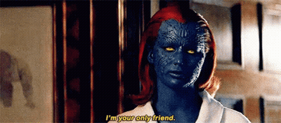 A Woman With Red Hair And Blue Skin Is Talking To A Man In A Room . GIF