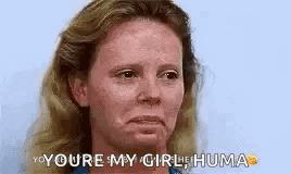 A Woman With Red Hair And Freckles Is Making A Funny Face And Says `` You 'Re My Girl ! '' GIF