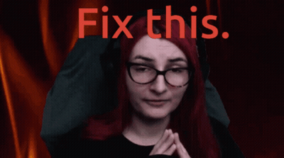 A Woman With Red Hair And Glasses With The Words Fix This Written Above Her GIF