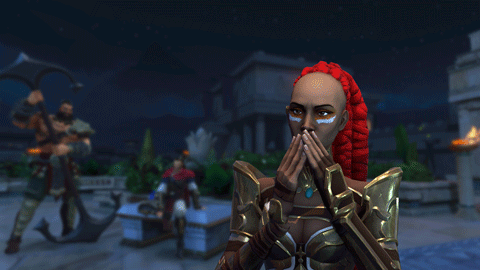 A Woman With Red Hair And White Paint On Her Face Is Covering Her Mouth GIF