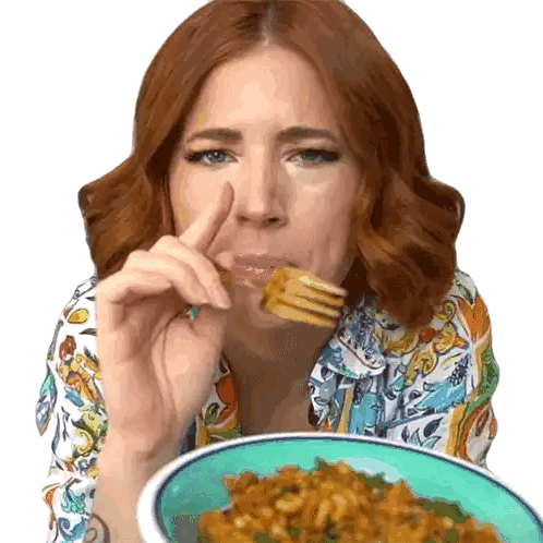 A Woman With Red Hair Is Eating Noodles With A Fork From A Bowl Sticker