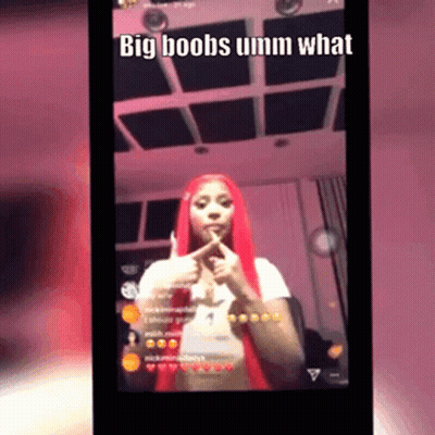 A Woman With Red Hair Is Giving A Thumbs Up And Says Big Boobs Umm What GIF