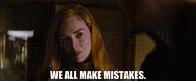 A Woman With Red Hair Is Looking At The Camera With The Words `` We All Make Mistakes '' Written Below Her . GIF