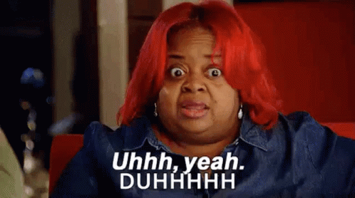 A Woman With Red Hair Is Making A Funny Face And Saying `` Uhh , Yeah , Duhhhh '' . GIF