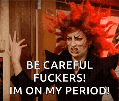 A Woman With Red Hair Is Saying Be Careful Fuckers I 'M On My Period GIF
