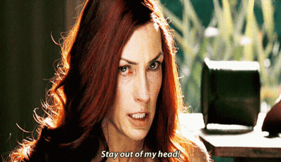 A Woman With Red Hair Is Saying Stay Out Of My Head . GIF