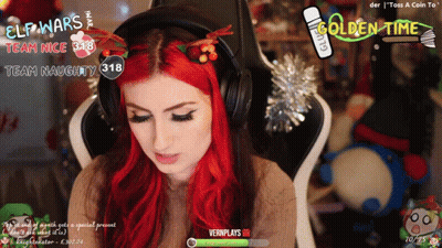 A Woman With Red Hair Is Sitting In A Chair With Headphones On And The Words Golden Time On The Screen GIF