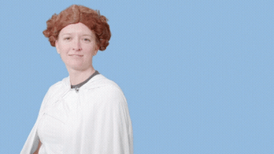 A Woman With Red Hair Is Smiling In Front Of A Blue Background With The Words You 'Re Our Only Hope GIF