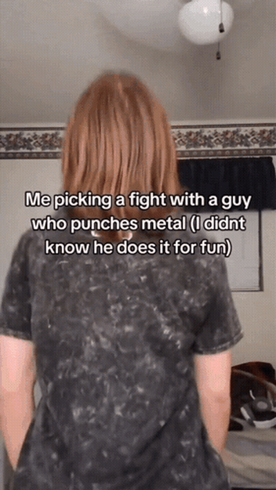 A Woman With Red Hair Is Standing In Front Of A Wall With A Caption That Says Me Picking A Fight GIF