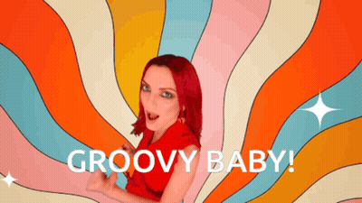 A Woman With Red Hair Says Groovy Baby In Front Of A Psychedelic Background GIF